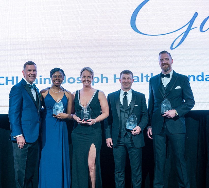 Anthony Houston, Ed.D., FACHE, CEO, CHI Saint Joseph Health; Amanda Jumper, director, Human Resources (accepting the award for Summer Price, Employee of the Year); Crystal Thomas (Leader of the Year), Christian Kemp (Advanced Practice Provider of the Year) and Dr. Tyler Holley (Physician of the Year).